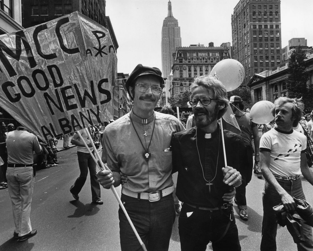 Members of a Gay Rights march on Fifth Avenue, New York. Reverend John Kuiper (right) was the first gay man in America to win the right to adopt a child, he is next to his partner Roger Hooverman. (Getty)